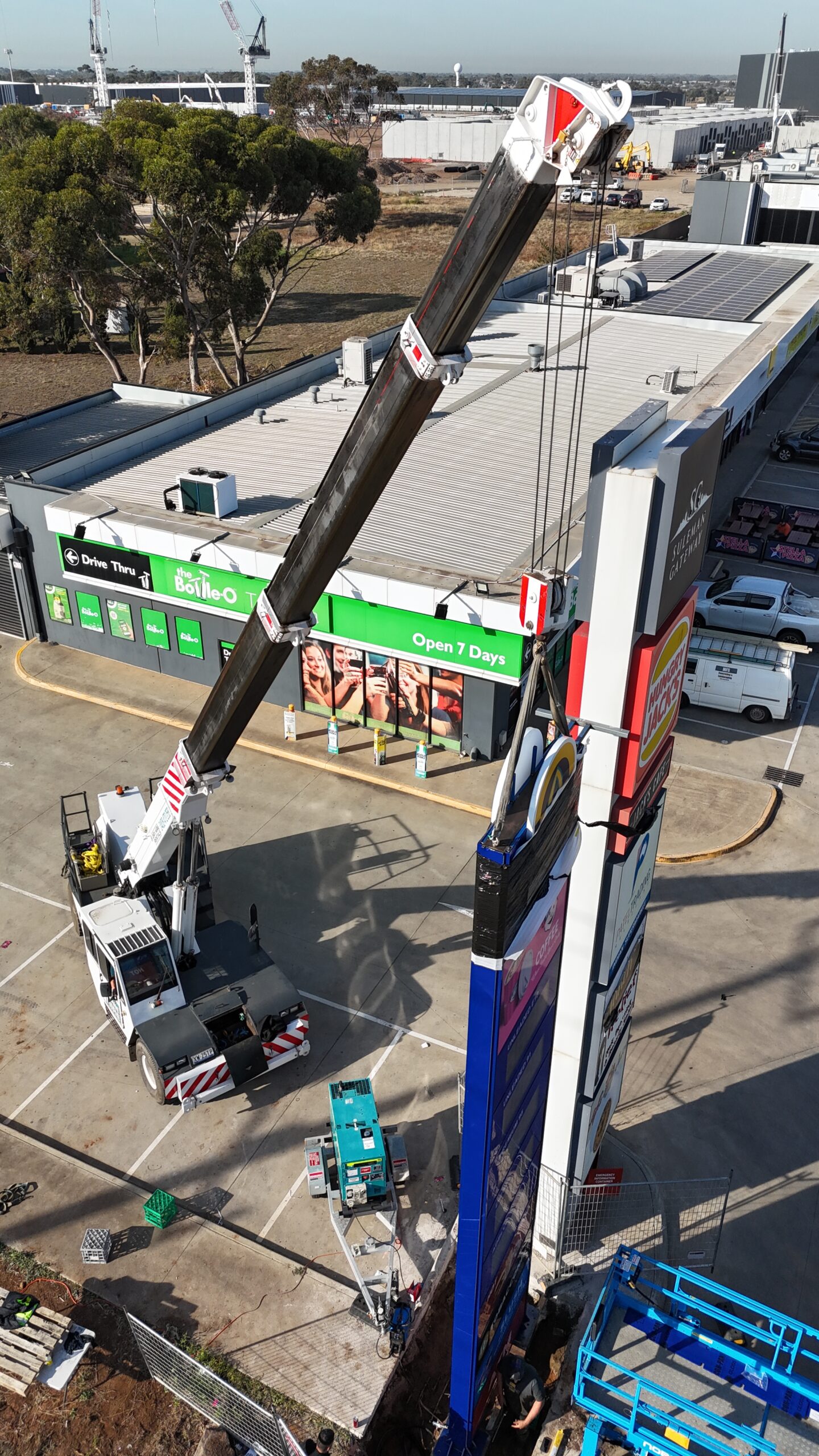 Heavy Lifting: Maneuvering a Pylon Sign into Place